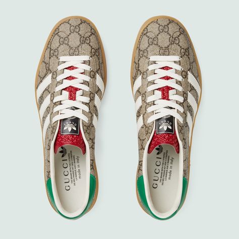 Shop the adidas x Gucci men's Gazelle sneaker in beige at GUCCI.COM. Enjoy Free Shipping and Complimentary Gift Wrapping. Adidas Gucci Gazelle, Adidas X Gucci, Adidas Gucci, Sneakers Gucci, Harrods London, Gg Monogram, Adidas X, Sportswear Brand, Gucci Men