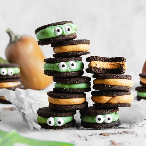 Halloween ‘Oreo’ Monster Sandwich Cookies-Dairy Free, Gluten-free, Low Glycemic & Vegan-friendly | C Backen Halloween, Gluten Free Halloween, Halloween Oreos, Recipes Halloween, Postres Halloween, Dulces Halloween, Vegan Halloween, Orange Frosting, Baking With Almond Flour