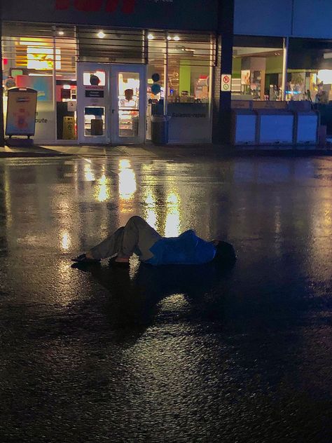 Sneaking In Aesthetic, Sneaking Out Pictures, Lying In Rain, Laying In The Rain Aesthetic, Lying In The Rain, Sitting In Rain, Person In The Rain, Sneak Out, People In Rain