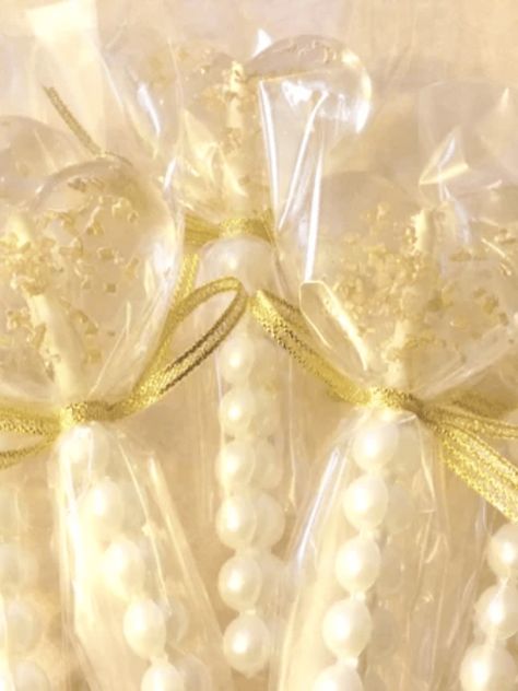 Timeless but also trendy, pearls are hot right now for weddings. Browse some of our favorite pearl wedding details to incorporate into your big day. Pearl Wedding Favors, Pearl Themed Bridal Shower, Pearl Theme Bridal Shower Ideas, Pearl Bridal Shower Theme, Pearl Wedding Ideas, Pearl And Gold Wedding, Pearls And Prosecco Theme, Pearl Themed Wedding, Pearl Wedding Decor