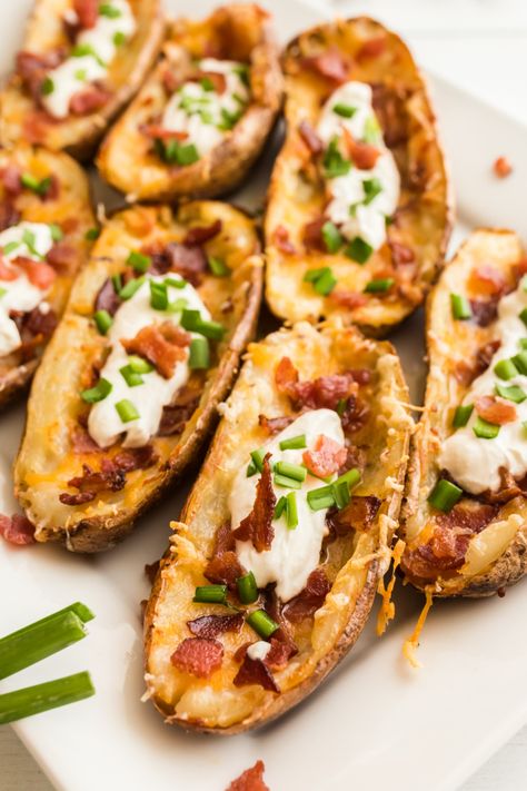 Potato Skins recipe from RecipesForHolidays.com #potato #skins #recipe #RecipesForHolidays Loaded Potato Skins Recipe, Loaded Baked Potato Skins, Potato Skins Recipe, Crispy Potato Skins, Parmesan Crusted Potatoes, Loaded Potato Skins, Baked Potato Skins, Potatoe Skins Recipe, Making Baked Potatoes