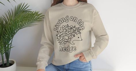 Living on the hedge Sweatshirt Hedgehog Sweater #hedgehog #hedgehogsweater #hedgehogsweatshirt https://vintageandnewkeeper.etsy.com/listing/1680909626 Hedges, Sweatshirts, On Instagram, Quick Saves, Instagram