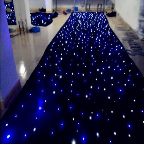 1.this items is made of high quality fireproof black velvet, with extremely high brightness LED covered on the surface. 2.The quantity of led on the Curtain goes around to 16 ~ 20 piece per square met Starry Night Prom, Celestial Wedding Theme, Decoration Stage, Galaxy Wedding, Starry Night Wedding, Prom Themes, Prom Decor, Star Wars Wedding, Quinceanera Themes