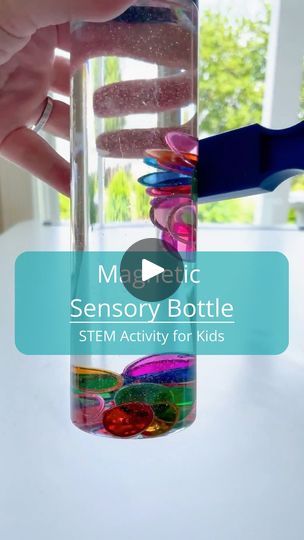 10K views · 1.1K reactions | Comment MAGNET and I will send you a list of the supplies you need to make a Magnetic Sensory Bottle! 🧲

This sensory bottle is great for early STEM learning and exploring magnetic properties. My kids love using the magnetic wand to lift the chips in the bottle. 

This bottle is also a great way for younger kids (who may be too young to play with the chips on their own) to explore magnetic properties! 

❗️Just make sure to glue the lid on the bottle and young children should be supervised! 

🧲To make add the following to a tall bottle:
-Clear oil (like baby oil)*
-Magnetic chips

*I used oil in this bottle instead of water to prevent the pieces from rusting.
 

#kidactivity #magneticplay 
#activityideas #activitiesfortoddlers #playideas #kidsactivities #senso Stem Sensory Bins, Magnetic Chips Activities, Magnetic Wand Activities, Magnet Activities, Used Oil, Sensory Bottle, Bingo Chips, Sensory Bags, Early Childhood Learning