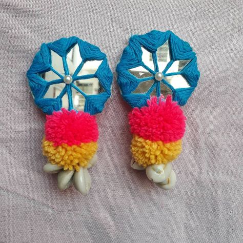 Mirror with cowrie earrings.. Colour can be customized.. #pompom #jewelry #handmadejewelry #style #statement #surat #tasselearrings… Embroidery Latkans, Pompom Jewelry, Cowrie Earrings, Painted Jewellery, Mirror Earrings, Fabric Jewellery, Beaded Earrings Diy, Diy Things, Painted Jewelry