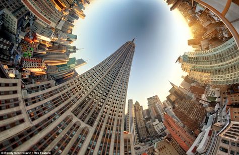 Empire State building in New York with a fisheye lens which get all 360 degrees of the city into view Fisheye Photography, Panoramic Photography, Creative Landscape, Surreal Photos, Fish Eye Lens, Architectural Photographers, Pictures Of The Week, Digital Art Illustration, Akita