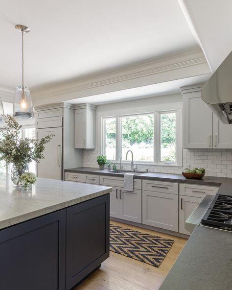 Kitchen; light gray cabinets, navy island and subway tile Navy Island, Island Cabinet, Gorgeous White Kitchen, Dry Kitchen, Light Grey Kitchen Cabinets, Grey Blue Kitchen, Light Grey Kitchens, Light Gray Cabinets, Navy Kitchen