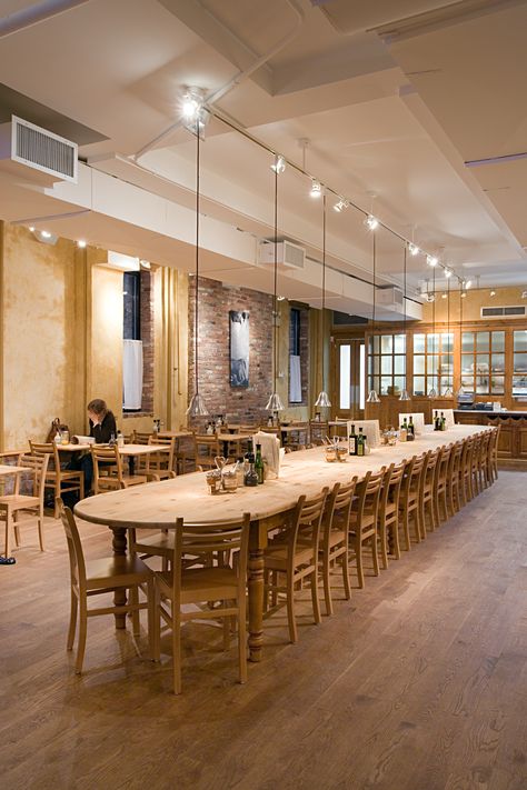 Le Pain Quotidien | Tobin | Parnes Design | Archinect Bakery Dining Area, European Bakery Interior, French Bakery Aesthetic Interior, Communal Table Cafe, Cafe Communal Table, Restaurant Table Design, Tea Room Design, Mobile Shop Design, Farmhouse Restaurant