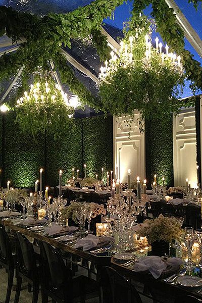 Transform a tent into an enchanted garden with grassy walls and ivy-covered chandeliers. Themed Wedding Decorations, Indoor Garden Wedding, Secret Garden Parties, Garden Party Theme, Indoor Chandelier, Garden Party Decorations, Garden Wedding Decorations, Wedding Tent, Wedding Top