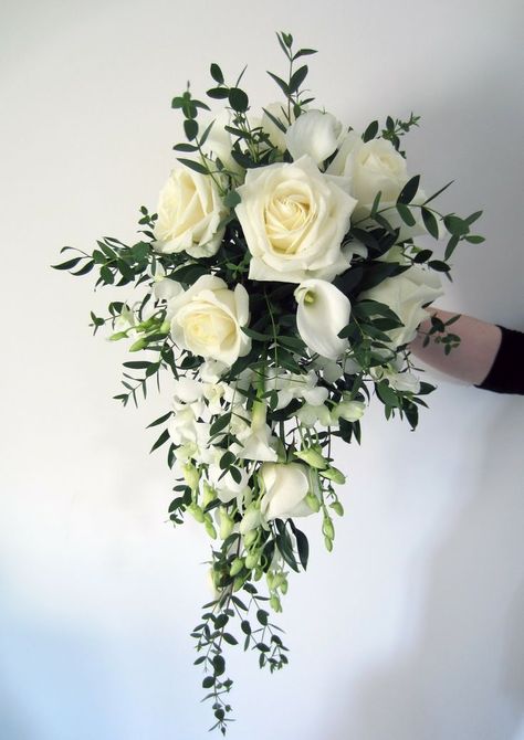 Bride to Be Reading ~ dendrobium white orchids -  roses, calla lily and for the greens, it looks like Italian ruscus. I would use different greens on the top and sides and add variegated ivy as the long stems along with the ruscus. This is a tear drop and by adding different greens, it would be less formal and would have more "movement" and texture. White Rose Wedding Bouquet, Calla Lily Bouquet Wedding, Greenery Wedding Bouquet, Cascading Bridal Bouquets, Cascading Wedding Bouquets, Spring Wedding Bouquet, Bridal Bouquet Flowers, White Bridal Bouquet, Cascade Bouquet