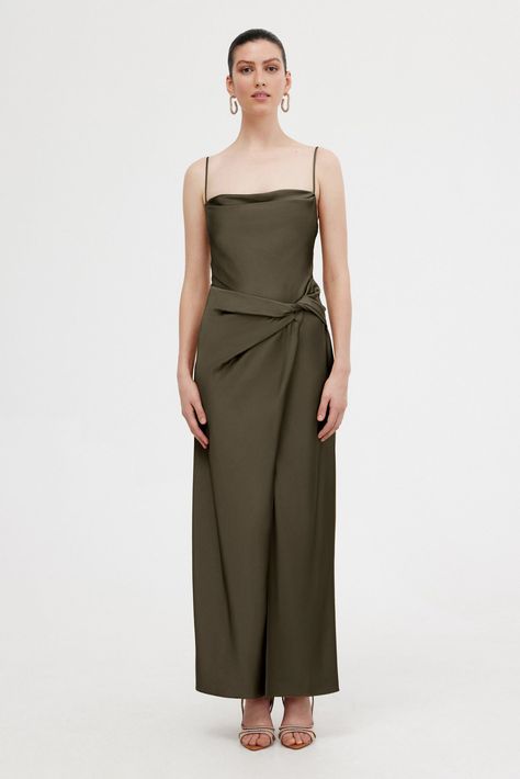 An elegant silhouette, designed to move with the wearer. The Esme Maxi Dress in Olive is crafted from our soft touch satin fabrication. Subtle cowl neckline, draping detail at the waist, accentuated split and spaghetti straps. A great option for bridesmaids. PRODUCT DETAILS - Midi dress - Unlined - Invisible back zip - Split - Adjustable straps Model is 177cm / 5’9” wearing an 8AU / 4US Composition: 62% Viscose Rayon, 38% Polyester CARE INSTRUCTIONS This fabric has been specially woven. Because Dresses Illustration, Trend 2025, Celine Fashion, Hunny Bunny, Dress Illustration, Drape Dress, Olive Green Dresses, Viscose Rayon, Poplin Dress