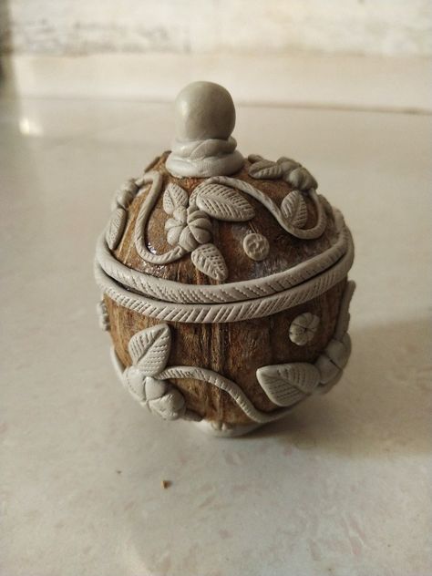 This craft made with coconut shell and mouldet clay and I gave this a beautiful floral look Shell Diy, Coconut Shell Crafts, Shell Craft, Shells Diy, Clay Art Projects, Shell Art, Craft Box, Shell Crafts, Coconut Shell