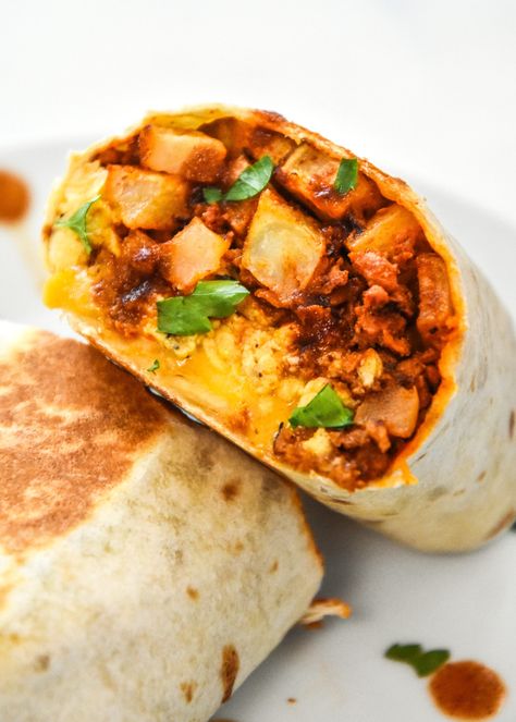 Start your day with one of these Meal Prep Soy Chorizo Breakfast Burritos! These vegetarian burritos are packed with roasted seasoned potatoes, bell peppers, eggs, cheese and soy chorizo for the ultimate make-ahead breakfast! ProjectMealPlan.com Soy Chorizo, French Toast Bites, Chorizo Breakfast, Seasoned Potatoes, Cold Lunches, Breakfast Burrito, Cooked Breakfast, Meal Prep Containers, Lunch Meal Prep