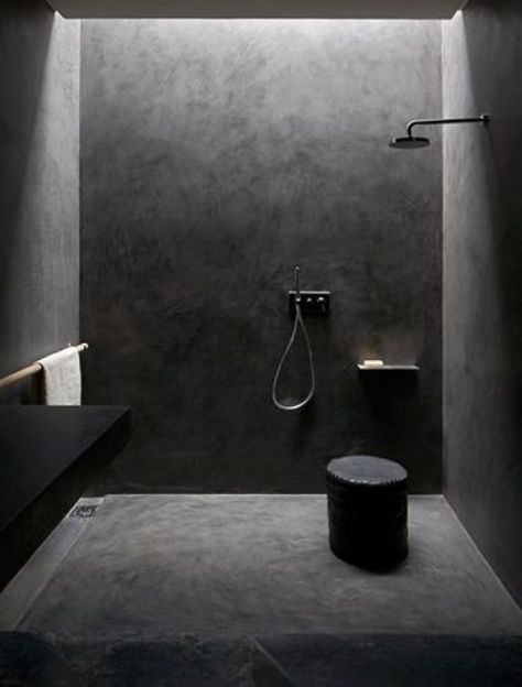 dark concrete all over the shower for a minimalist look Black Microcement Bathroom, Dark Microcement Bathroom, Dark Concrete Bathroom, Microcement Bathroom, Industrial Bath, Minimal Bathrooms, Drømme Bad, Classy Interior, Black Interiors