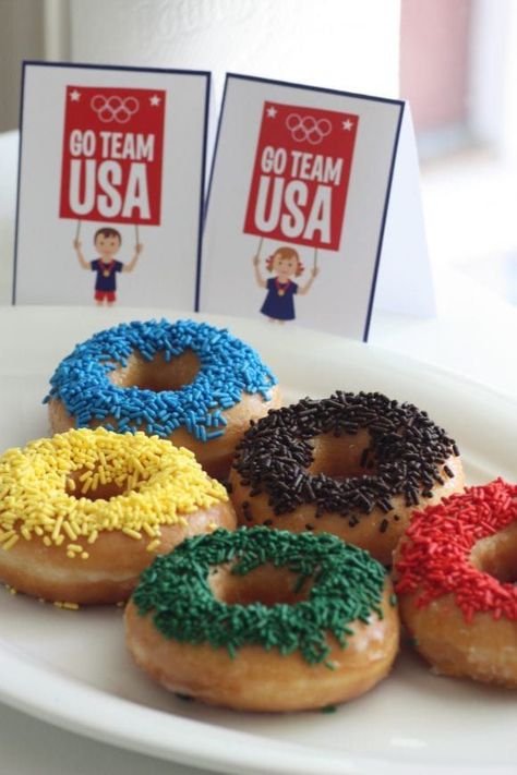 Olympic Games Donuts + Free Printables | CatchMyParty.com Olympic Breakfast Ideas, Olympic Games Party Food, Olympic Party Decorations Diy, Olympics Party Theme, Olympic Games Decorations, Kids Olympics Party, Olympic Snacks For Kids, Olympics Birthday Party For Kids, Olympic Birthday Party For Kids