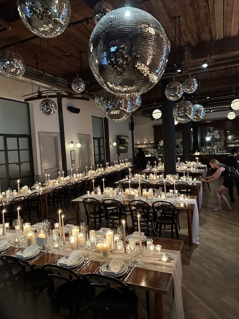 Pillar And Taper Candle Centerpiece, Pillar And Taper Candles Wedding, Tapered And Pillar Candles Wedding, Nye Wedding Centerpieces, Candle Heavy Wedding Table, Candle Focused Wedding Centerpiece, Candle Reception Decor, Disco Ball Ceiling Decor Wedding, Wedding Reception With Disco Balls