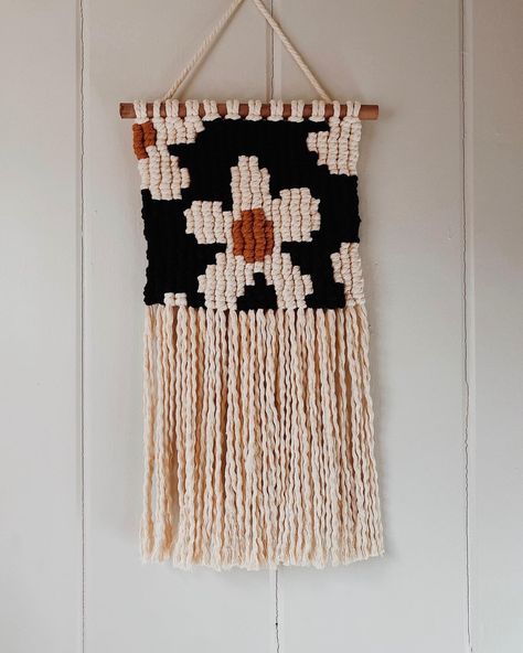 Add this macrame floral wall hanging to any space in your house, gift it to a friend who has a funky home decor or add it to a nursery for a sweet soft touch! This cutie is set on a hand stained wooden dowel, made of 100% cotton cord and hangs about 12 in x 15 in from dowel to fringe. Each one is handmade to order so may differ slightly from the one pictured! Flower Macrame Wall Hanging, Macrame Alphabet, Wall Macrame Hanging, Floral Macrame, Floral Wall Hanging, Power Wall, Hippie Homes, Fabric Cord, Wall Hanging Boho