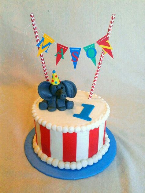 First birthday circus smash cake with super fun elephant and colorful banner! Circus Smash Cake, Carnival Birthday Cakes, Circus First Birthday, Circus Cakes, Circus 1st Birthdays, Carnival Cakes, Colorful Banner, Carnival Birthday Party Theme, Circus Cake