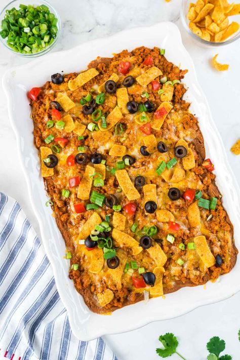 Easy Turkey Taco Casserole Ground Turkey Taco Casserole, Tacos Casserole, Turkey Taco Casserole, Taco Casserole Recipes, Ground Pork Tacos, Seasoned Ground Turkey, Easy Taco Casserole, Beans And Cheese, Buffalo Chicken Tacos