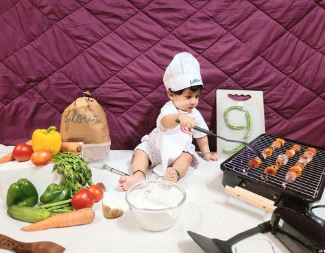 Kitchen theme baby photoshoot ideas at home Master Chef Baby Photoshoot, Chef Theme Baby Photoshoot, Kitchen Theme Baby Photoshoot, Chef Baby Photoshoot, Baby Chef Photoshoot, Chef Photoshoot Ideas, 9 Months Baby Photoshoot, Birthday Photoshoot At Home, Chef Photoshoot