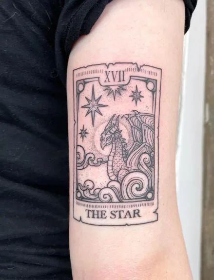 40 Tarot Card Tattoo Ideas To Create Your Own Destiny Simple Tarot Card Tattoo, Star Tarot Card Tattoo, The Star Tarot Tattoo, Tarot Tattoo Ideas, Tarot Card Tattoo Ideas, Card Tattoo Ideas, Tattoos 2024, Twin Tattoos, Tarot Interpretation