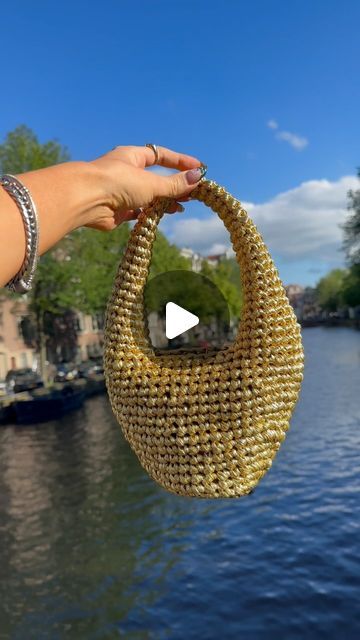 𝐻𝒶𝓃𝓃𝒶𝒽 𝒷𝓎𝑔𝒶𝓁𝓀 🍉 on Instagram: "Crocheting with gold (aka metallic T-shirt yarn)!

.

.

.

.

.

#crochet #crochethandbag #crochetbag #crochetideas #crochetinspiration #crochetaddict #crochetlove #crochettutorial" Handmade Gold Crochet Bag For Summer, Handmade Gold Crochet Tote Bag, Gold Woven Crochet Tote Bag, Sequin Crochet Bag, Metallic Crochet Bag, Girls Accesories, Metallic Yarn, Crochet Girls, T Shirt Yarn