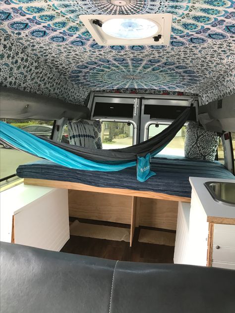 Storage below the bed.....and of course she installed a hammock for lounging. Hammock In Van, Hammock Bed, Van Conversion, Ford Transit, Ambulance, Simple Living, Van Life, Bunk Beds, Of Course