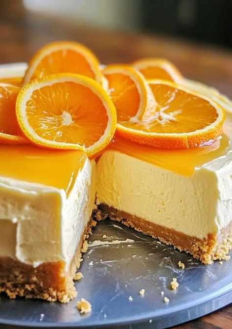 Enjoy a taste of summer with this creamy, tangy, and refreshing Orange Creamsicle Cheesecake, perfect for any occasion. Ingredients For ... Read more Orange Dreamsicle Cake Recipe, Orange Creamsicle Cheesecake Recipe, Orange Creamsicle Cheesecake, Orange Cheesecake Recipes, Creamsicle Cheesecake, Cheesecake Factory Recipes, Orange Dreamsicle, Fall Table Centerpieces, Baked Cheesecake Recipe