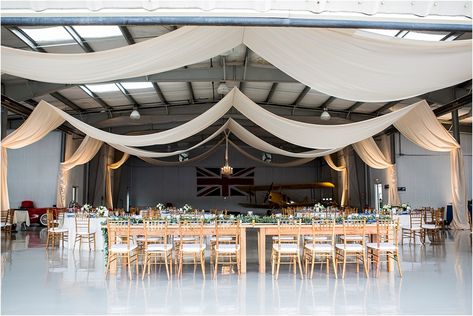 An aviation themed wedding in an Easton Airport hangar filled with vintage airplanes by Eastern Shore of Maryland wedding planner Kari Rider Events. Airplane Hanger Party, Airplane Hanger Wedding, Airplane Hangar Wedding, Eastern Shore Maryland Wedding, Airport Wedding, Hangar Wedding, Airplane Hanger, Aviation Wedding, Airplane Hangar