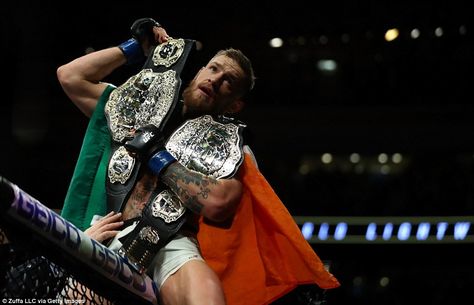 McGregor becomes the first fighter in UFC history to hold two different weight belts at the same time Conor Mcgregor Belts, Ufc Fighters Tattoo, Conor Mcgregor Wallpaper, Mcgregor Wallpapers, Notorious Mcgregor, Ufc Conor Mcgregor, Connor Mcgregor, Amanda Nunes, Notorious Conor Mcgregor