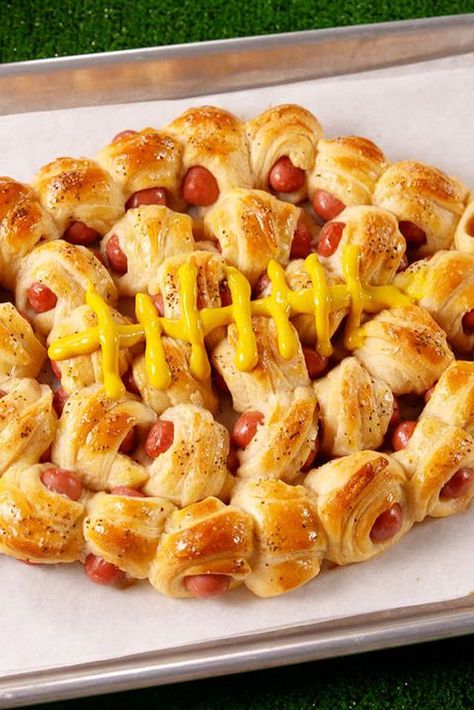 70+ Easy Crescent Roll Recipes – Best Things to Make with Crescent Rolls—Delish.com Thanksgiving Pigs In A Blanket, Football Shaped Foods, Easy Crescent Roll Recipes, Football Desserts, Easy Crescent Rolls, Sandwich Vegetarian, Kids Treats, Bowl Party Food, Superbowl Appetizers