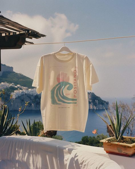 Seize the surf in our Positano 1980 Tee. For the girl who makes waves both on the beach and off, this is your summer statement tee. Unisex soft cotton crew neck t-shirt featuring a Positano Italy Surf Camp graphic printed on the front. Fabrics: 100% cotton, 6 oz Made in: LA Surf Brands Clothing, Surf Merch, Summer Graphic Tees, Beach Tshirt, Surf Aesthetic, Beachy Aesthetic, Surf Vibes, Wellness Club, Surf Brands