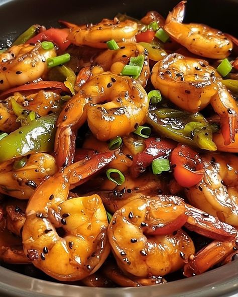 🍤 Shrimp and Pepper Stir-Fry 🌶️ Ingredients: 1 lb shrimp, peeled and deveined 1 red bell pepper, sliced 1 green bell pepper, sliced 1 yellow bell pepper, sliced 1 small onion, sliced 3 cloves garlic, minced 2 tbsp soy sauce 1 tbsp oyster sauce 1 tbsp cornstarch 1/4 cup water 2 tbsp vegetable oil Salt and pepper to taste Instructions: Prepare the Sauce: In a small mixing bowl, whisk together soy sauce, oyster sauce, cornstarch, and water until smooth. Set aside. Cook the Shrimp: In a large ... Chinese Prawns, Regime Food, Cornstarch And Water, Lobster Recipes Tail, Stir Fry Ingredients, Yellow Bell Pepper, Green Bell Pepper, Lobster Recipes, Creole Recipes