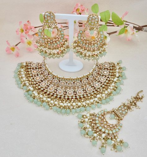 m creations By Monika on Instagram: “Stunning Mint Green and Gold Bridal Necklace set with Tikka . Available in 2 colours . DM to place an order .” Gold Bridal Necklace Set, Green Jewelry Set, Mint Green Jewelry, Mint Green Necklace, Bridal Jewlery, Colour Set, Gold Bridal Necklace, Bridal Necklace Set, Indian Jewelry Sets