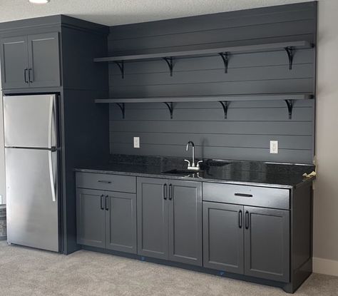 Garage With Fridge Ideas, Black Garage Cabinets Ideas, Refrigerator In Garage Ideas, Finished Garage Interior, Garage Black Cabinets, Garage Kitchen Cabinets Ideas, Garage With Cabinets, Cabinets In Garage Ideas, Black Garage Cabinets