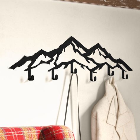 Bring the spirit of the mountains home and keep your entryway clutter-free at the same time with this coat rack! The coat rack features a design which depicts a mountain range along with five hooks ideal for hanging coats, jackets, scarves, hats and more. Installation is required. Coat Hanging Ideas Entryway, Coat Rack Ideas, Coat Wall, Hanging Coat Rack, Beachy Room, Metal Hanger, Coat Hangers, Metal Rack, Hook Wall