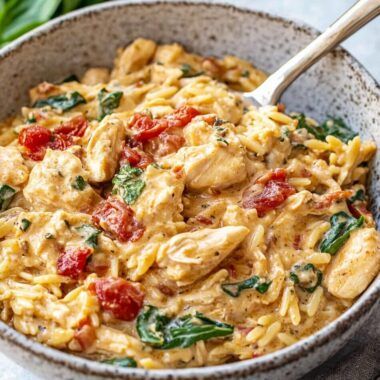 Tuscan Chicken Orzo Crockpot, Chicken Orzo Recipes Slow Cooker, Italian Dishes Crockpot, Crockpot Orzo Chicken, Orzo Tuscan Chicken, Slow Cooker Creamy Tuscan Chicken Orzo, Throw In Crockpot Meals, Orzo Slow Cooker Recipes, Creamy Tuscan Chicken Orzo