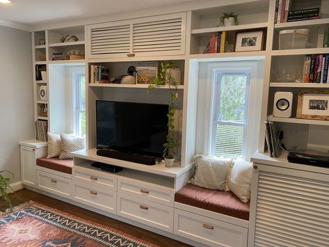 Hired a wonderful cabinet maker (Anto’s Custom Cabinetry) to create this entertainment unit. Perfect way to hide our mini split and radiator! Split Unit Air Conditioning Hide, Split Unit Air Conditioning Cover, How To Hide A Mini Split Unit, How To Hide A Mini Split, Hide A Mini Split, Hide Tv In Bookcase, Mini Split Cover, Built In Around Mini Split, Hide Mini Split