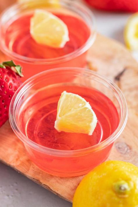 Strawberry Lemonade Jello Shots! How To Make Jello Shots – EASY & BEST Jello Shot Recipe Strawberry Lemonade Jello Shots Recipe, Birthday Jello Shots Alcohol, Pink Lemonade Jello Shots Recipe, Strawberry Lemonade Jello Shots, Pink Lemonade Jello Shots, Pink Starburst Jello Shots, Starburst Jello Shots, Peach Tea Cocktail, Alcohol Jello Shots