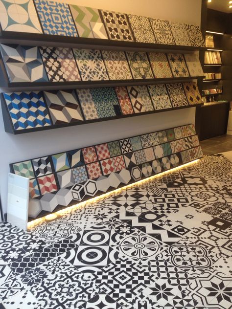 Encaustic cement tile display. Visit us online. http://www.terrazzo-tiles.co.uk/ Tiles Display Ideas, Tile Display Ideas, Tiles Terrazzo, Tile Display, Terrazzo Wall Tiles, Tiles Display Showroom Ideas, Tile Display Showroom, Tiles Showroom Display Ideas, Tiles Showroom Interior Design