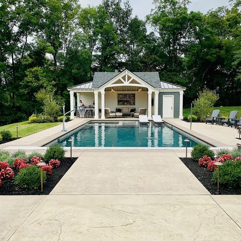 All this cold weather has me thinking back to the pool house I built in the summertime. The client was looking for a spot for a bar, bathroom, and place to hang out for the pool they were having installed. I built it to match the style of their house so it all fit cohesively. I like how it turned out and could definitely use one of those warm sunny days real soon! #PoolHouse #SummerProject #PoolInspo #Project #FinishedProject #OldSchoolCraftsman Pool Houses With Fireplace, Pool House Grill Area, Pool Houses With Outdoor Kitchens, Pool House Aesthetic, Pool House With Bathroom, Hamptons Pool, Small Pool House, Pool And Pool House Ideas, Farmhouse Pool