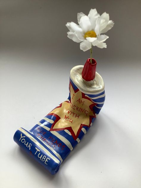 This ceramic bud vase is hand made by me and finished with ceramic paint . It is quirky and usable , it can be a gift to a friend or loved one Clay Gift Ideas, Clay Aesthetic, Flag Book, Ceramic Bud Vases, Vase Clay, Ceramic Bud Vase, Ceramic Art Sculpture, Polymer Clay Miniatures, History Projects