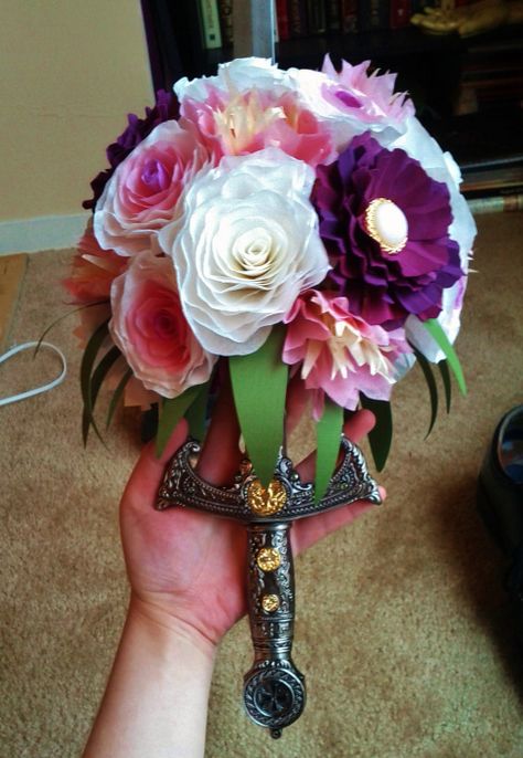 Medieval Wedding Reception, Pirate Bouquet, Dnd Wedding Theme, Celtic Wedding Decorations, D&d Wedding Theme, D&d Wedding, Wedding Swords, Dark Weddings, Fairy Wedding Theme