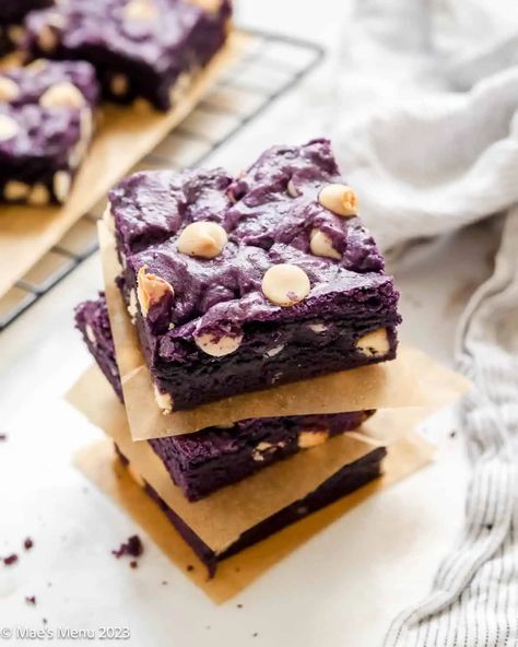 These showstopping Ube Brownies are deliciously fudgy and buttery! Made with vibrant ube extract and topped with sweet white chocolate chips, these will quickly become your favorite brownies. This easy-to-make, one-bowl recipe is the perfect indulgent treat that kids will love and the adults too! #ube #brownies #fudgybrownies #easysnacks #snacksforkids Spooky Foods For Halloween, Ube Brownies, Halloween Treats Ideas, Ube Dessert Recipe, Ube Extract, Spooky Foods, Halloween Treat Ideas, Purple Desserts, Ube Recipes