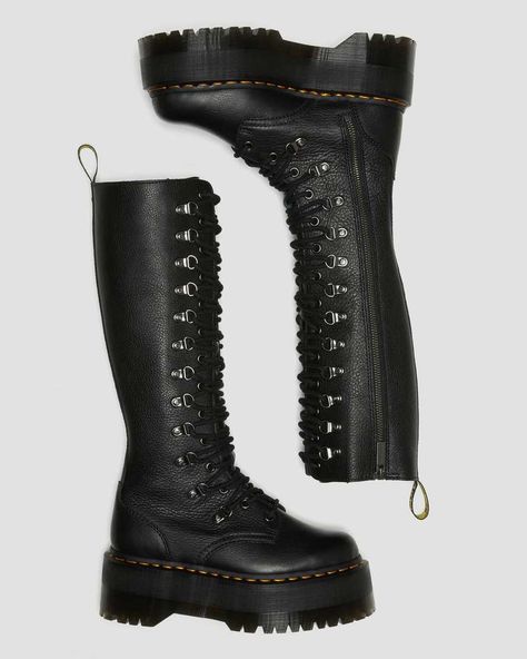 Only for the brave. Our new 1B60 boots hit max volume. Then go even louder. Set on our highest ever platform sole, the knee-high boots have a towering 20-eye silhouette enhanced with a statement dual lacing system – a combination of eyelets and logo rivet D-rings. Crafted from soft Pisa leather, the platform boots are finished with an inside zip for easier access. They come marked with yellow welt stitching and a scripted AirWair heel loop. Pisa is a medium-weight milled nappa leather with a sof Womens Platform Boots, Dr Martens High Boots, Platform Docs, Max Volume, Black Lace Boots, Knee High Platform Boots, Laced Boots, Goth Boots, Black Dr Martens