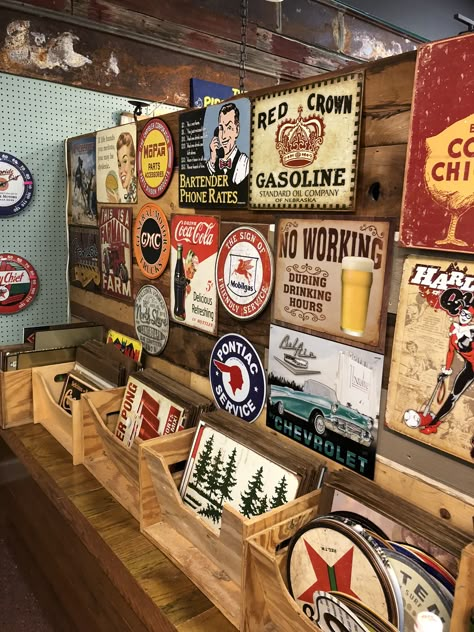 Metal Sign Display Ideas, Eclectic Art Wall, Playroom Garage, Basement Signs, Tin Sign Wall Decor, Old Commercials, Metal Signs Decor, Store Interiors, Garage Signs