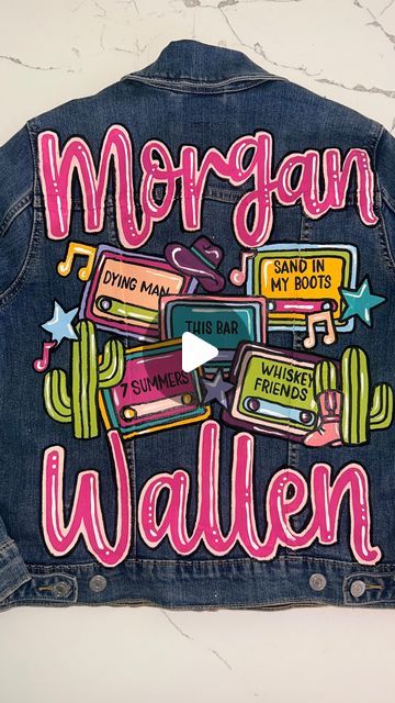 Jordan Tinker on Instagram: "Morgan Wallen Cassette Tape Jacket 🤩💕  . . . . . #morganwallen #countrylife #countrymusic #concertoutfit #countryconcert #painteddenim #denimjacket #morganwallenconcert" Nashville Jean Jacket, Morgan Wallen Jean Jacket Diy, Diy Painted Denim Jacket, Concert Jeans, Jean Painting, Jean Jacket Diy, Painted Denim Jacket, Painted Jacket, Diy Jacket