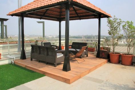 Perennial flowers around gazebo in the terrace classic style balcony, veranda & terrace by interioforest plantscaping solutions classic | homify Gazebo On Terrace Garden, Gazebo Terrace Ideas, Terrace Wall Ideas, Terrace Covering Ideas, Indian Gazebo, Sitout Ideas, Balcony Roof Design, Rooftop Gazebo, Gazebo Terrace