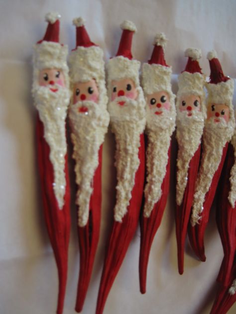 dried okra crafts | Santa ornaments made from dried okra. Okra Crafts Diy, Okra Pods Crafts, Okra Santa Ornament Diy, Okra Ornaments Handmade, Dried Okra Crafts, Okra Christmas Crafts, Dried Okra Decorations, Okra Pod Santas, Wooden Spoon Santas