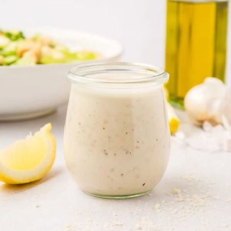 If you're making an at-home caesar salad, look no further than Ina Garten's Caesar Dressing! Joanna Gaines Caesar Dressing, Ina Garten Caesar Salad Dressing, Traditional Caesar Dressing, Cesar Dressing Recipes, Caesar Dressing No Mayo, Low Calorie Caesar Dressing, Ceaser Salad Dressing Recipe Homemade, Ceased Salad Dressing, Authentic Caesar Dressing